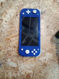 Prijenosna igraća konzola Nintendo Switch Lite plave boje – neispravna, za dijelove: ne puni se i ne uključuje (stanje: vidi 2. sliku) 2