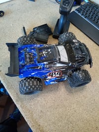 Mașină cu telecomandă PENGBU RC Monster Truck 1/14, off-road, 40 km/h, 4WD — defectă, funcționează parțial: roată dreapta față deteriorată (stare: vezi a 2-a fotografie) 5