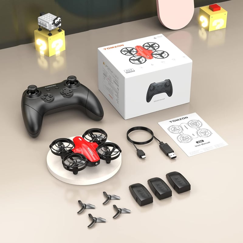 Tomzon Mini Drón Gyerekeknek - 24 Perces Repülési Idő, 360° Védelem, Távirányítós Quadcopter