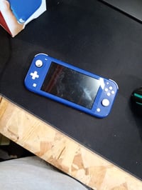 Nintendo Switch Lite Kék - Hordozható Játékkonzol Gyerekeknek és — hibás, alkatrésznek: nem kapcsol be (állapot: lásd a 2. képet) 2