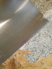 Tocător și planșetă de patiserie din oțel inoxidabil Goeasyoii 60x40 cm, cu margine de fixare, suprafață pentru aluat și copt în bucătărie, argintiu - Produs utilizat 4