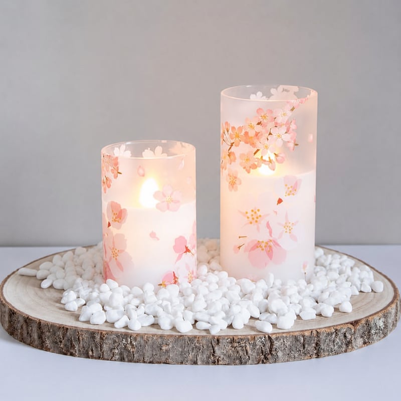 Set Lumânări LED fără flacără Mavandes, 2 bucăți, cu telecomandă și temporizator, model floare de cireș, ceară naturală, 7,5x10 și 7,5x12,5 cm, lumină caldă