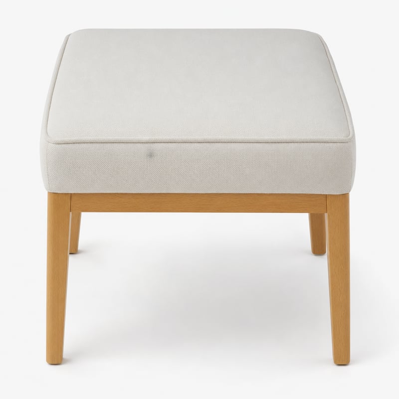 Puf pătrat tapițat modern Amazon Basics, culoarea fildeșului, in, picioare în formă de X din lemn masiv — cu pete pe țesătură, produs utilizat
