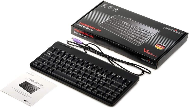 Perixx PERIBOARD-409 P Kompakt Mini PS/2 Vezetékes Billentyűzet - Fekete - QWERTZ Német Kiosztás - Windows Kompatibilis - 88 Gombos