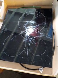 Plită cu inducție Bosch PUJ611BB5E Serie 4, 60 cm, 3 zone de gătit, Touch Select — parte inferioară ruptă, margine de cauciuc deteriorată (stare: vezi a doua fotografie) 4