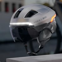 Cyklistická prilba ABUS HYP-E ACE s predným a zadným svetlom, blikačkou, priehľadným štítom a ochranou uší, kompatibilná s elektrobicyklami a S-Pedelec, veľkosť L, sivá 7
