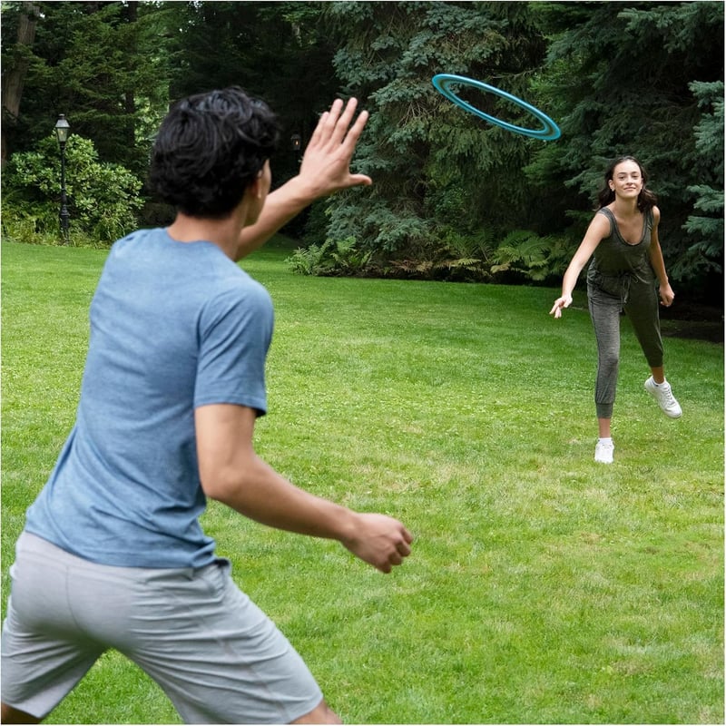Aerobie Pro Repülő Gyűrű - Narancssárga Frizbi Korong, Könnyű Műanyag, Kültéri Játék Gyerekeknek és Felnőtteknek, 33 cm

AI: I've created a 