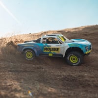 Automobil RC Desert Truck ARRMA Mojave GROM 4x4 Smart RTR albastru/alb ARA2104T2 cu acumulator și încărcător incluse 4