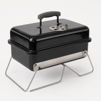 Weber Go-Anywhere hordozható faszenes grillsütő összecsukható lábakkal, porcelánzománcos tállal és légáramlás-szabályozással, fekete – használt 1