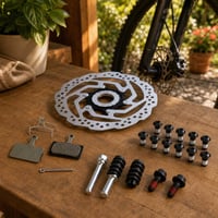 Komplet za disk kočnice: 2x pakne + 180 mm disk + set vodilica + 12x M5 vijaka 1