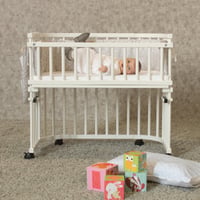 Set roți babybay pentru parchet - Pentru toate modelele babybay, alb - Transformă pătuțul în cărucior 4