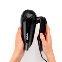 Uscător de păr pliabil de voiaj BaByliss 5334E – 2000W, pliabil, voltaj universal, 2 trepte de viteză, negru/portocaliu 2
