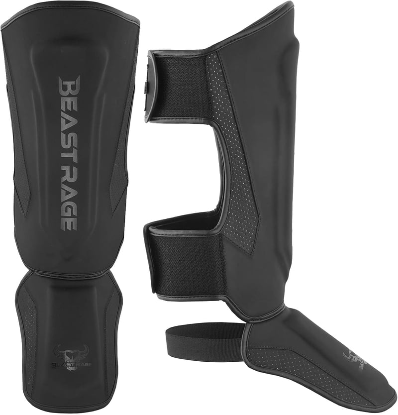 BEAST RAGE Bőr Sípcsontvédő Lábfejvédelemmel - Kickbox, MMA, Muay Thai, Karate Edzéshez - Arany Színű Kompakt Lábszárvédő