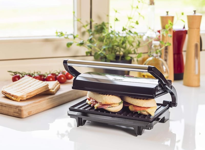 Bestron APM123Z elektromos kontakt grill 700W, fekete panini sütő, krumplitálca