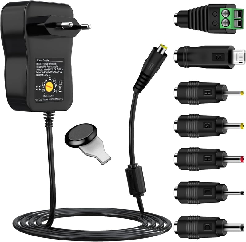 cshare Univerzális Hálózati Adapter 40W - 3V-12V Állítható Tápegység 7 Cserélhető Csatlakozóval és USB Porttal - LED, Router, Kamera Kompati