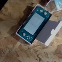 Prenosná herná konzola Nintendo Switch Lite tyrkysová - Viditeľné — Na produkte sú viditeľné škrabance a známky opotrebovania spôsobené používaním (stav: pozri 2. obrázok) 3