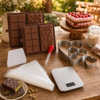 Tortavarázs kezdőkészlet: 2 db csokoládéforma + 3 db szívtortakarika + 100 db habzsák + 5 kg mérleg 1