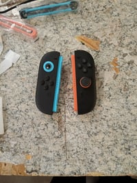 Pereche de controllere Nintendo Joy-Con 2, stânga bleu și dreapta — defecte, pentru piese: buton joystick smuls, drift (stare: vezi a 2-a poză) 2