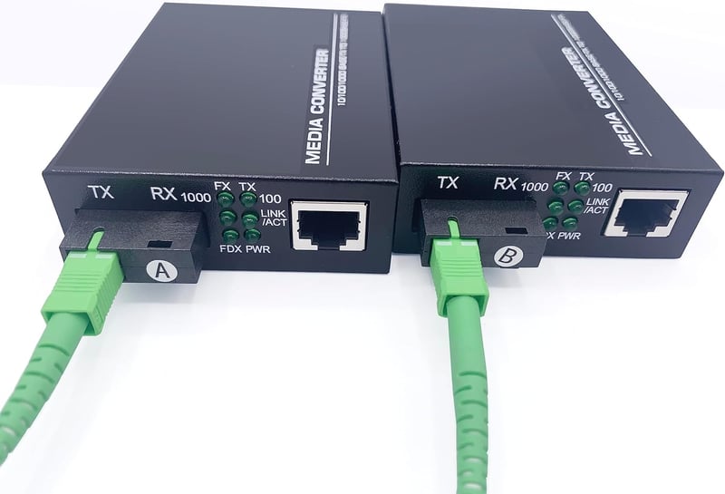 Elfcam Gigabit Ethernet Optikai Médiakonverter 10/100/1000 Mbps, Mini-GBIC (SFP), Egymodusú SC Csatlakozó, 20 KM Hatótáv, RJ45 Port