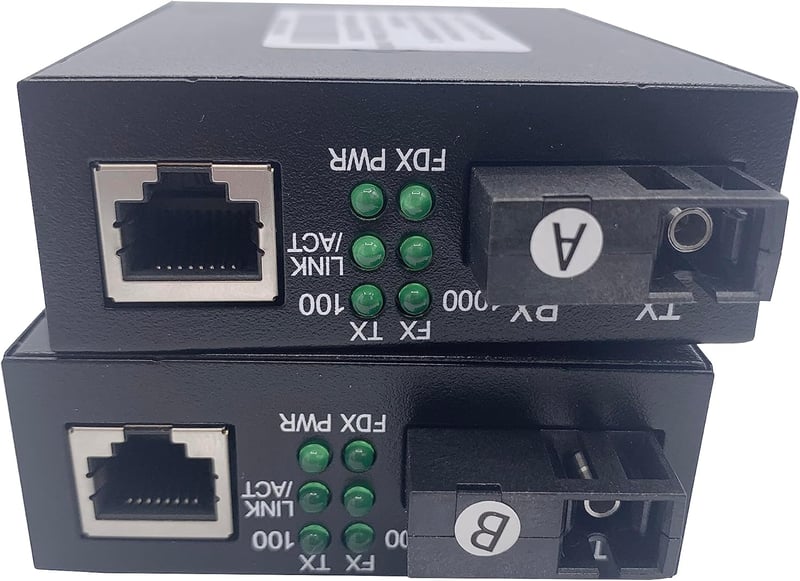 Elfcam Gigabit Ethernet Optikai Médiakonverter 10/100/1000 Mbps, Mini-GBIC (SFP), Egymodusú SC Csatlakozó, 20 KM Hatótáv, RJ45 Port