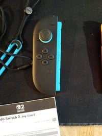 Pereche de controllere Nintendo Joy-Con 2, stânga albastru deschis și dreapta — defecte, funcționează parțial: joystick-ul portocaliu este defect (stare: vezi poza 2) 4