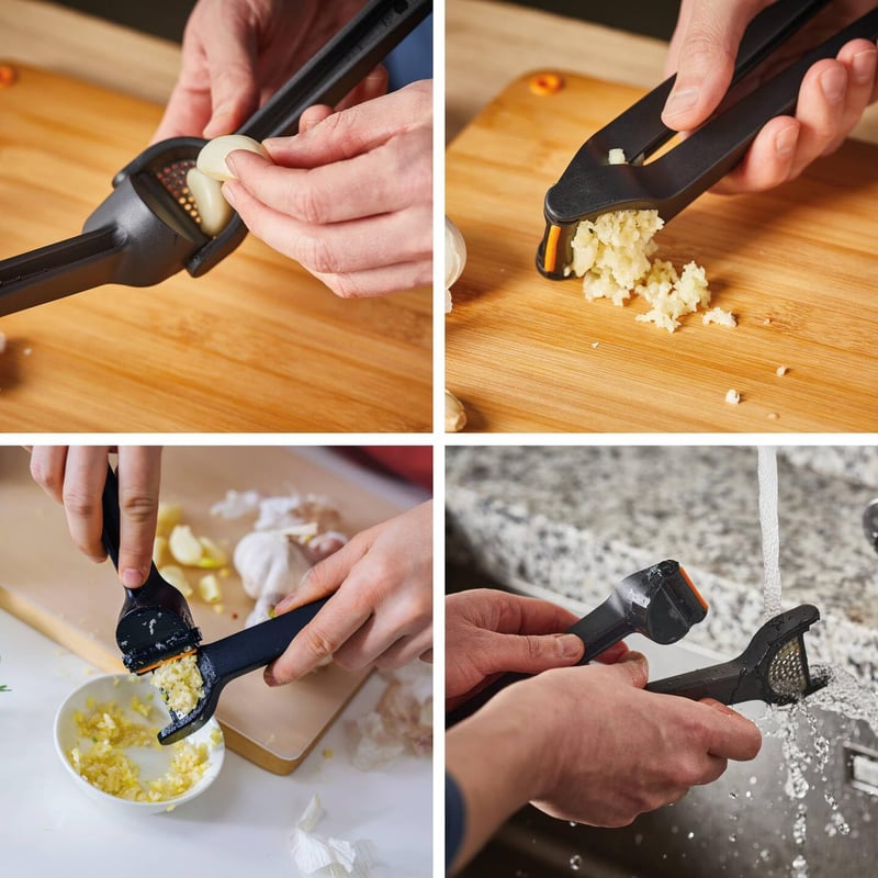 Fiskars Fokhagyma préselt 16cm-es összecsukható rács betéttel és kaparóval - garlic press