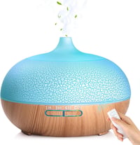 GeeRic Aroma Diffúzor 550ml - Ultrahangos Párásító Illóolajokhoz, 7 Színű LED Világítással, Távirányítóval, Időzítővel - Hálószobába, Irodáb 1