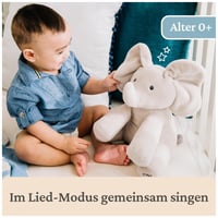 Elefănțel de pluș muzical și interactiv GUND Flappy – cu urechi care se mișcă pentru jocul de-a v-ați ascunselea, aprox. 30 cm, limba germană, recomandat de la 10 luni 6