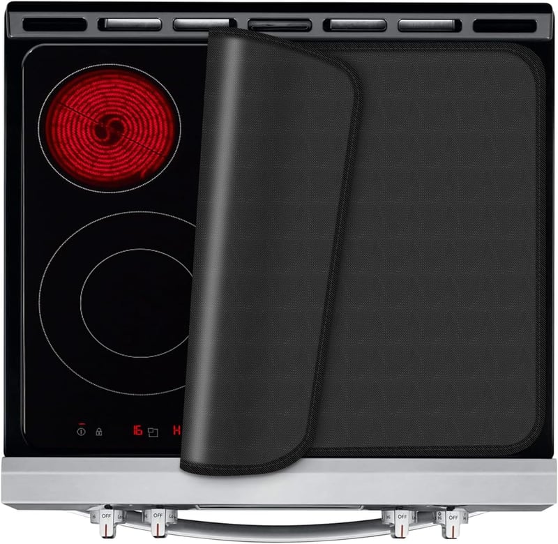 KitchenRaku Indukciós tűzhely védőlap, mágneses szilikontakaró 78x52cm fekete
