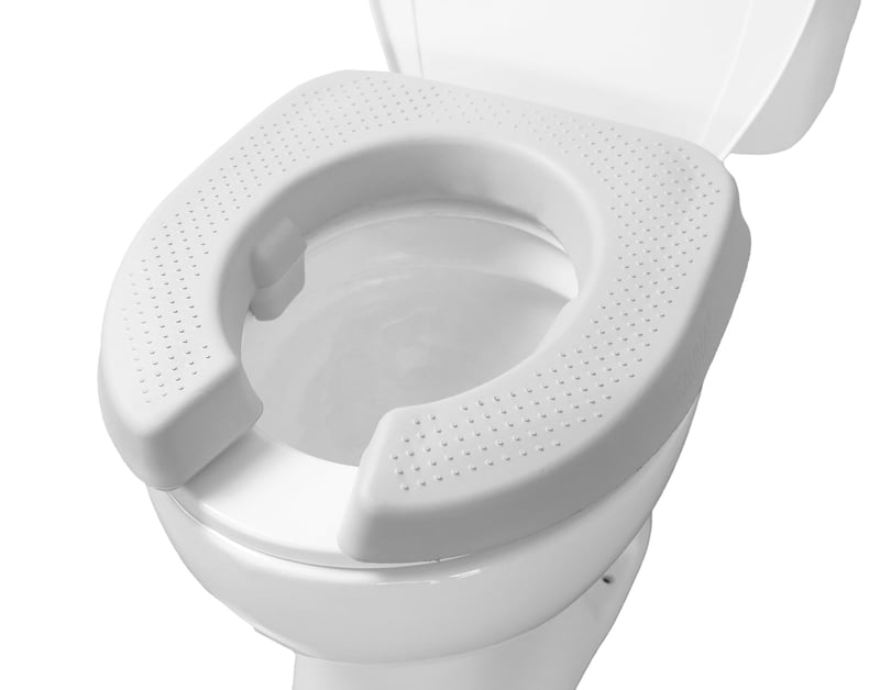 KMINA Vyvýšené WC sedadlo 5 cm, polstrované, vodoodolné, pre seniorov a imobilných ľudí, bez nutnosti montáže, patentované