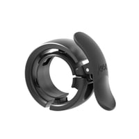 Cyklistický zvonček Knog Oi Prima – 22,2 mm, antracitová, 80 dB, úderník Wavetek, jednoduchá montáž 1