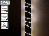 Konstsmide LED mini svjetleća cijev za vanjsku upotrebu, 5 m, 65 toplo bijelih LED dioda, sa senzorom svjetlosti i tajmerom, na baterije, IP44 4
