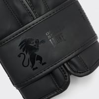 Boxerské rukavice Leone 1947 Striker GN059 Unisex čierne 12 oz tréningové rukavice pre dospelých 7