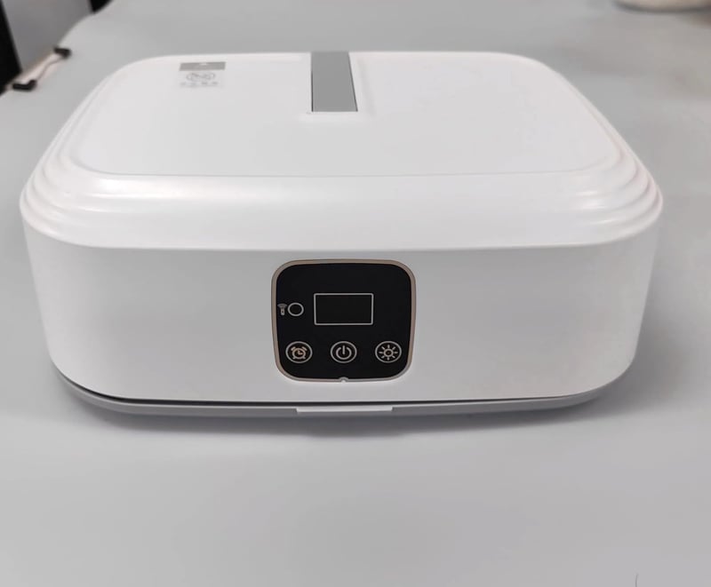 Nicoone Mini Hőszivattyús Ruhaszárító - Távirányítóval, UV Sterilizálással, 1-8 Órás Időzítővel, Kompakt Méretű Elektromos Szárítógép Utazás