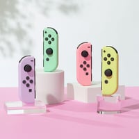 Pár Nintendo Joy-Con ovládačov – pastelová fialová a pastelová zelená – Nintendo — Chýba jeden úchyt na zápästie (stav: pozri 2. obrázok) 5
