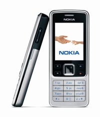 Mobilný telefón Nokia 6300 bez blokovania – čierno-strieborný, 2 Mpx fotoaparát, Bluetooth, FM rádio, hudobný prehrávač, 7,8 GB 3