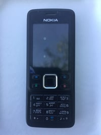 Mobilný telefón Nokia 6300 bez blokovania – čierno-strieborný, 2 Mpx fotoaparát, Bluetooth, FM rádio, hudobný prehrávač, 7,8 GB 7