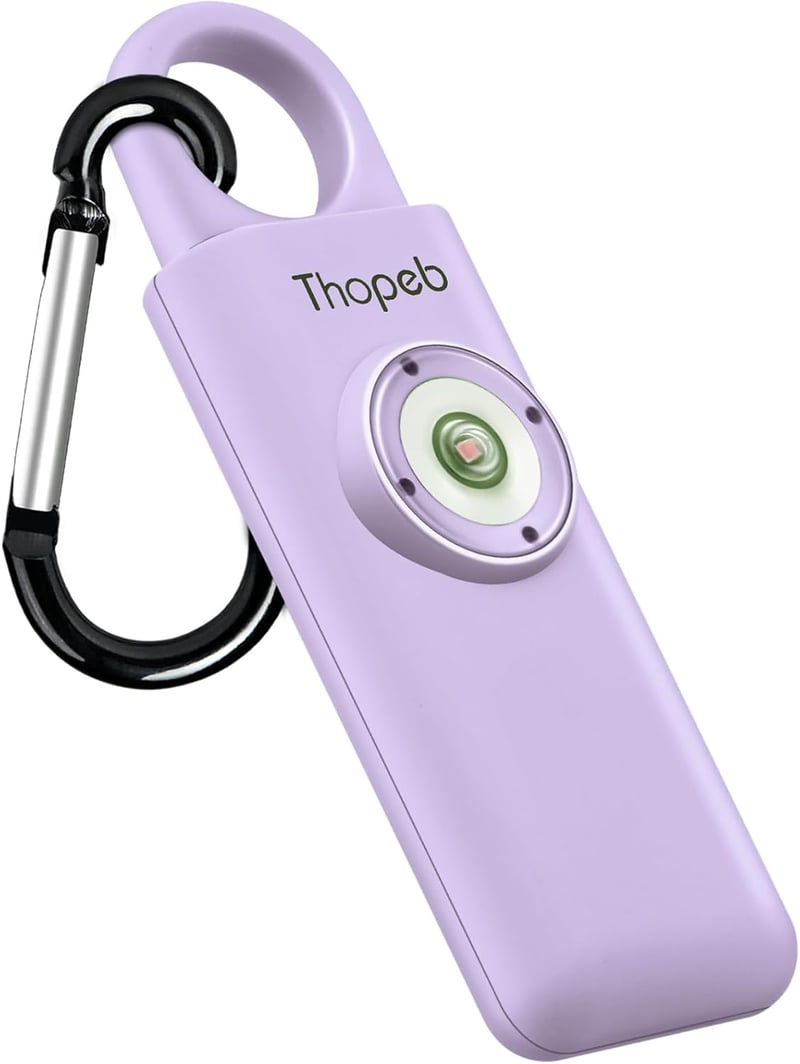 Thopeb Önvédelmi Kulcstartó Nőknek - 130 dB Hangos Riasztó, LED Villogó Fény, Vészjelző, Lila Színben, CR2032 Elemmel, 300m Hatótávolság