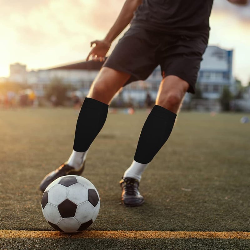 TUKNN Sípcsontvédő Zokni Fekete - Kompressziós Futball Harisnya Zsebekkel Felnőtteknek és Tinédzsereknek 24x13.5cm