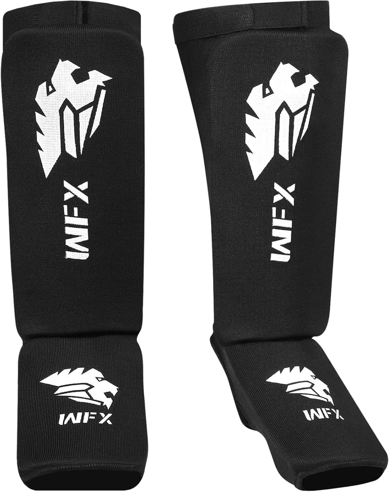 WFX Lábszárvédő Kickboxhoz és MMA Edzéshez - Fekete Bokavédő Muay Thai, Karate, Taekwondo Küzdősportokhoz - Rugalmas Párnázott S Méret