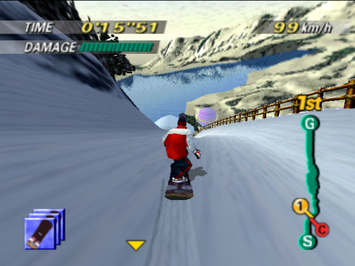 A snowboarder in red and white clothing descends a snowy mountain slope with a blue lake and rocky peaks visible in the background. The heads-up display shows elapsed time at 0:15:51, damage status in green text, speed at 99 km/h, and a minimap in the lower left with green and orange checkpoint markers labeled G, Q, C, and S on the right side. A wooden guardrail lines the right edge of the course, and a yellow flag marker appears on the left. The scene uses N64-era 3D polygon graphics with clear draw distance and mountain parallax depth.