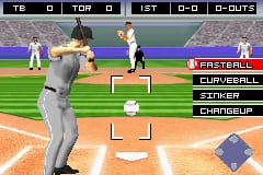 A baseball batter stands in the center of the field wearing a gray uniform, preparing to swing at an incoming pitch. The pitcher is visible in the distance on the mound, with fielders positioned across the infield. A HUD panel on the right displays pitcher options including fastball, sinker, slider, and changeup. The scoreboard and strike zone indicator are visible at the top of the screen. The graphics use low-resolution 32-bit sprites typical of Game Boy Advance baseball games, with a brown infield and green outfield grass.