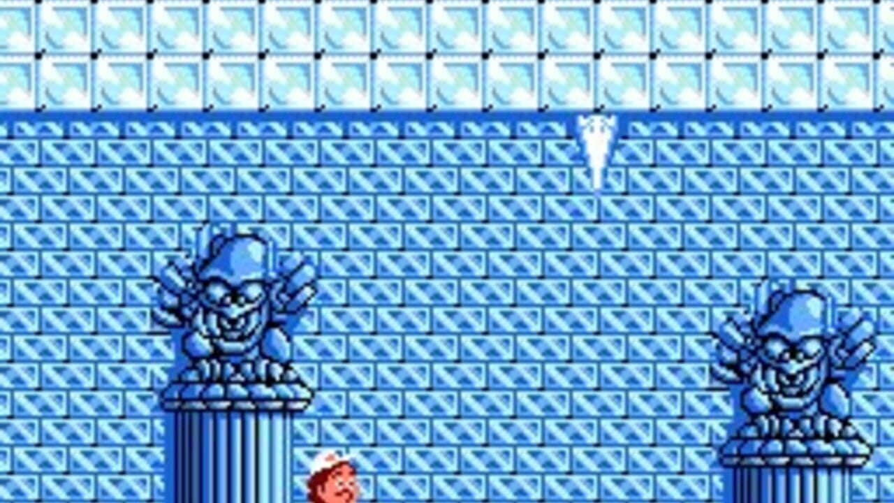 A red-haired character stands in the lower-left of a blue brick-tiled level. Two blue demon-faced statues with outstretched arms sit on pedestals in the middle and right areas. The upper portion shows light blue ice or snow tiles arranged in rows, with a white ice sickle sprite visible near the top center. The pixelated 8-bit art style uses a predominantly blue color palette with black outlines on all sprites.