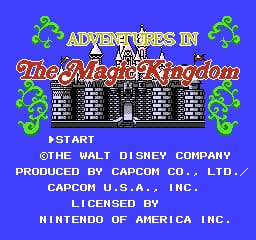 The title screen features the game's logo in orange text reading 'Adventures in the Magic Kingdom' centered above a pixelated castle structure with five towers in shades of gray and black. Green decorative vine or leaf graphics frame both sides of the castle. Below the castle, white text on the blue background displays 'START' and credits listing 'The Walt Disney Company', 'Produced by Capcom Co., Ltd.', 'Capcom U.S.A., Inc.', 'Licensed by Nintendo of America Inc.' The overall art style uses NES-era 8-bit sprites and a bright blue background.