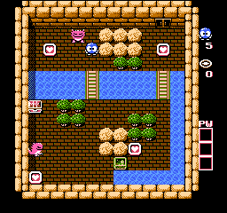 A puzzle-filled room layout in top-down perspective features a blue water moat surrounding a brick island with tan-colored walls and a decorative border. The central area contains spherical yellow objects, green vegetation patches, and scattered white eggs or collectibles. A small character sprite appears in the lower-left corner near a pink ladder. Gray bordered frames on the right edge and bottom likely indicate UI elements or inventory slots. The 8-bit pixel art uses a brown, blue, and yellow color palette typical of NES-era graphics.