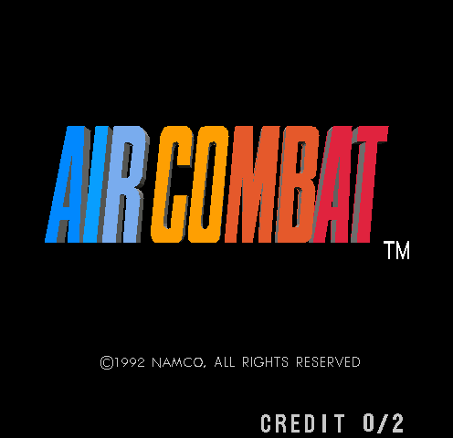 The Air Combat title screen displays the game logo in large multicolored letters—blue, yellow, orange, and red—centered on a black background with a trademark symbol in the upper right. Below the logo appears the copyright text "©1992 NAMCO, ALL RIGHTS RESERVED" in small white capital letters. At the bottom of the screen, white text reads "CREDIT 0/2", indicating the arcade credit display. The overall layout is simple and symmetrical, with all text and graphics arranged vertically down the center.