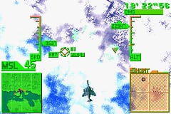 A top-down aerial view displays a fighter jet centered on screen amid clouds rendered in blue and white pixels. The HUD shows green targeting reticles and numerical coordinates in the upper corners. A radar or map overlay appears in the lower left displaying terrain in green and blue. Enemy positions and ground structures are marked across the beige and green landscape below, with a sandy base visible in the lower right corner. The overall visual style uses bright primary colors typical of GBA-era sprite graphics with visible pixelation throughout.