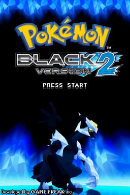 The title screen displays 'POKÉMON' in yellow lettering at the top, followed by 'BLACK 2' and 'VERSION' in blue and white text below. A silhouetted legendary Pokémon figure occupies the center-lower portion against a backdrop of blue crystalline or flame-like shapes. 'PRESS START' appears in white text at the bottom center. The background features a gradient of dark tones with bright blue light effects creating a dynamic atmosphere.