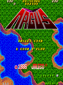 The title screen displays "ARGUS" in large red letters with black outline at the center-top of the screen. Below the title sits "GOTTLIEB 1984" text in yellow. The background shows a stylized bird's-eye view landscape with bright green grass areas, blue water sections, and brown terrain patches. At the bottom, yellow text reads "© 1986 GOTTLIEB" and additional game information appears in small yellow font. The overall color palette uses primary greens, blues, browns, and reds typical of early 1980s arcade graphics with low-resolution pixel art.