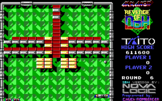 A DOS-era Arkanoid II level displays a green brick field with a red vertical divider in the center. Multiple rows of bricks in green, red, and yellow occupy the upper two-thirds of the playfield. A paddle sits at the bottom center, with a ball in play. The right side shows game text including title logo, player indicator, round number, and status information. Pixel art sprites and simple geometric brick patterns characterize the early 1990s computer graphics style.